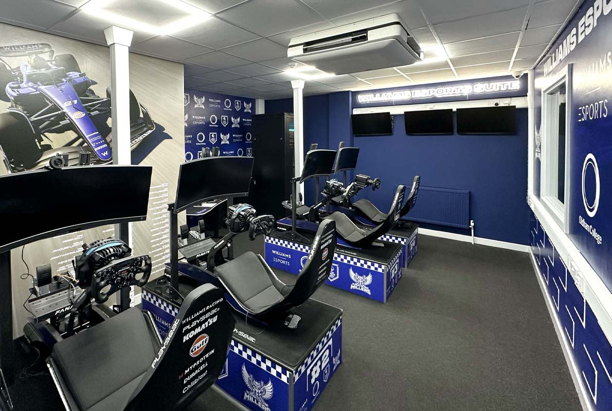 Large format vinyl and acrylic signs designed, printed, and installed for Williams Esports room at Sheffield United Football Club, featuring bold branding graphics and modern esports visuals.